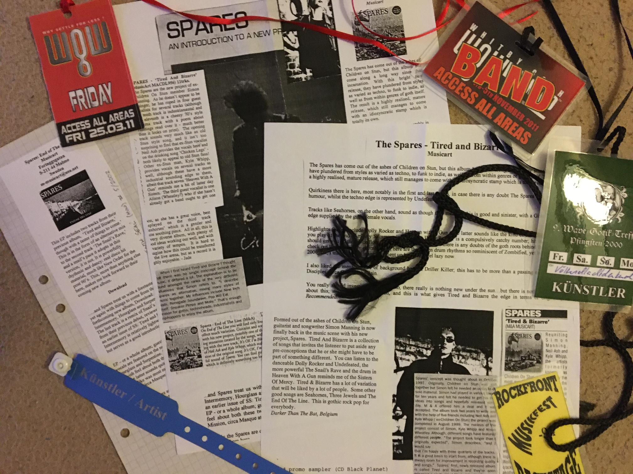 Scrap book, reviews, backstage passes and other tour memorabilia scattered about